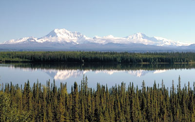 mountains reflecting in lake